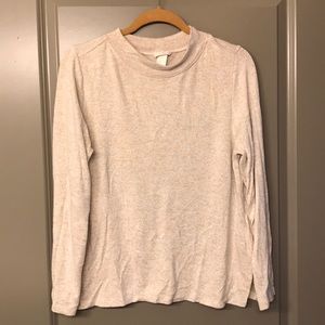 Beige long sleeve turtleneck sweater